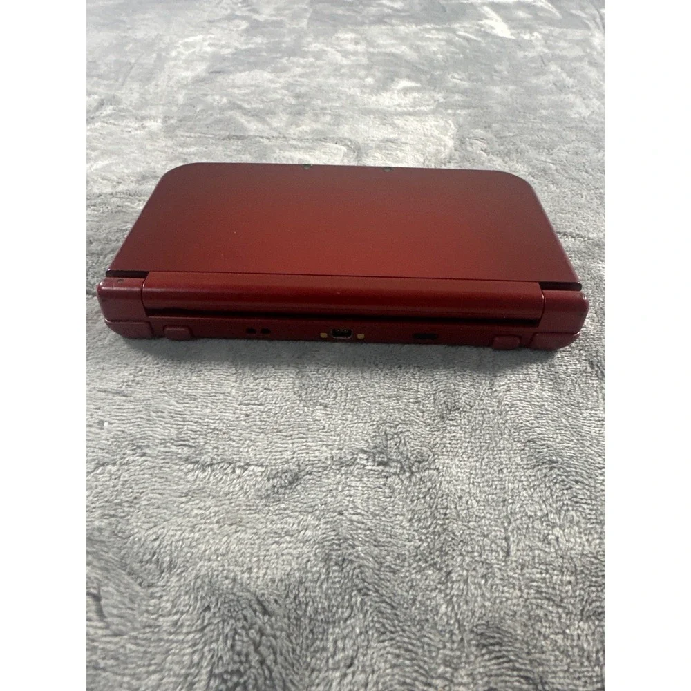 Nintendo New 3DS XL Metallic Red. Stylus and charger NOT included